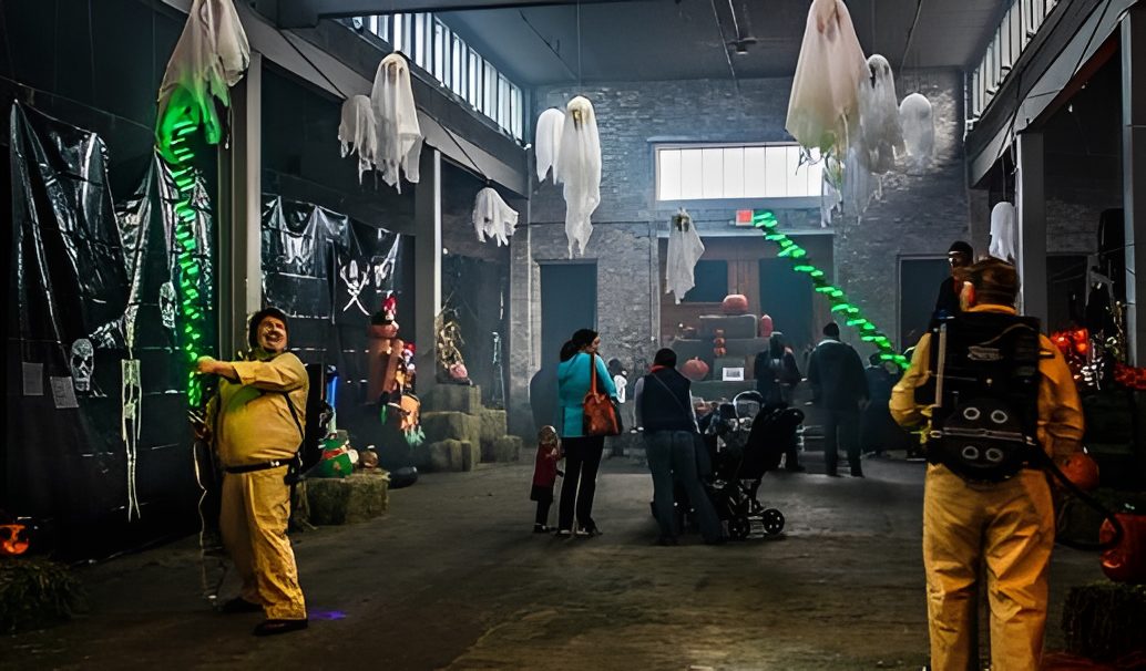 Halloween-themed event with ghost decorations and costumes.